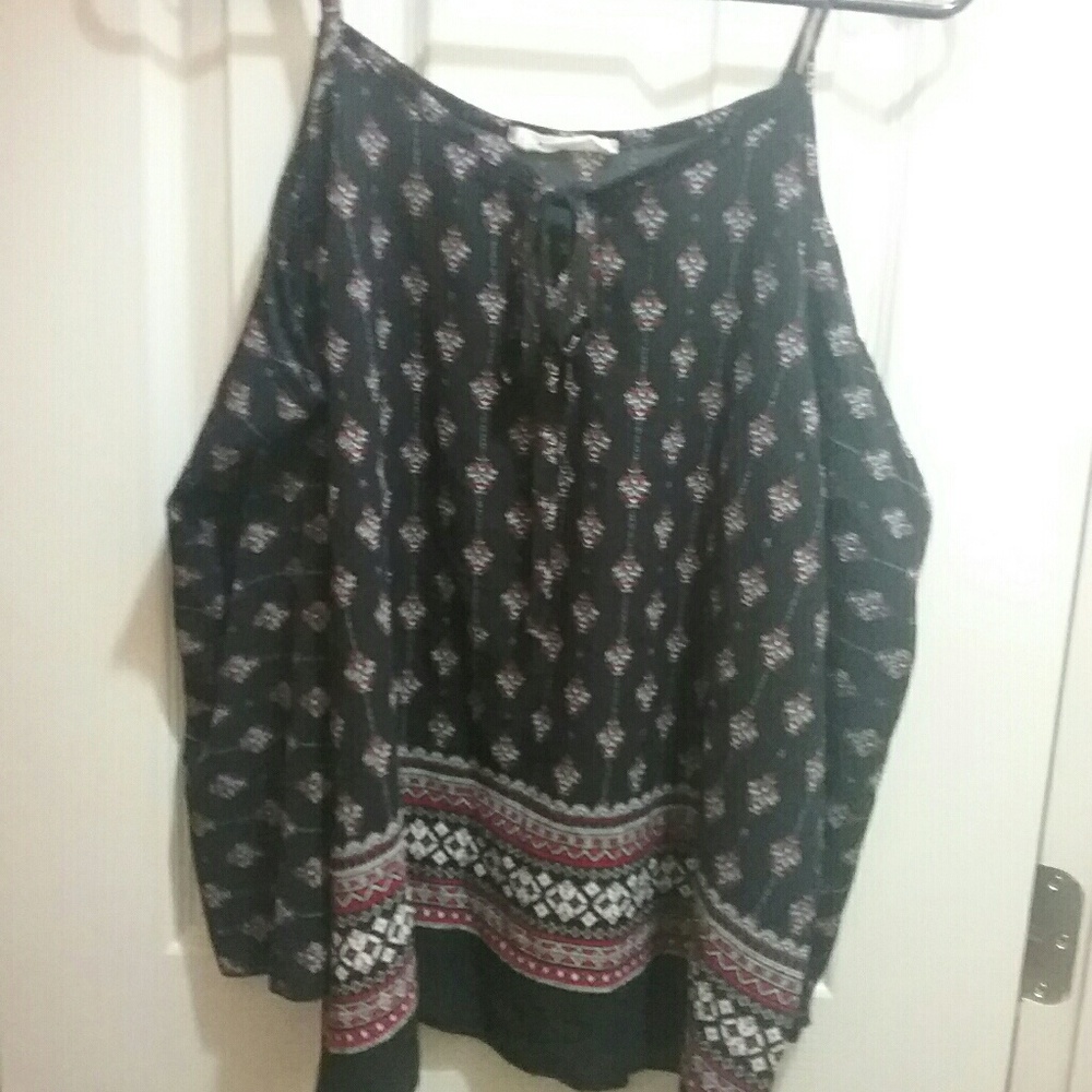 Long sleeved, shoulder showing blouse